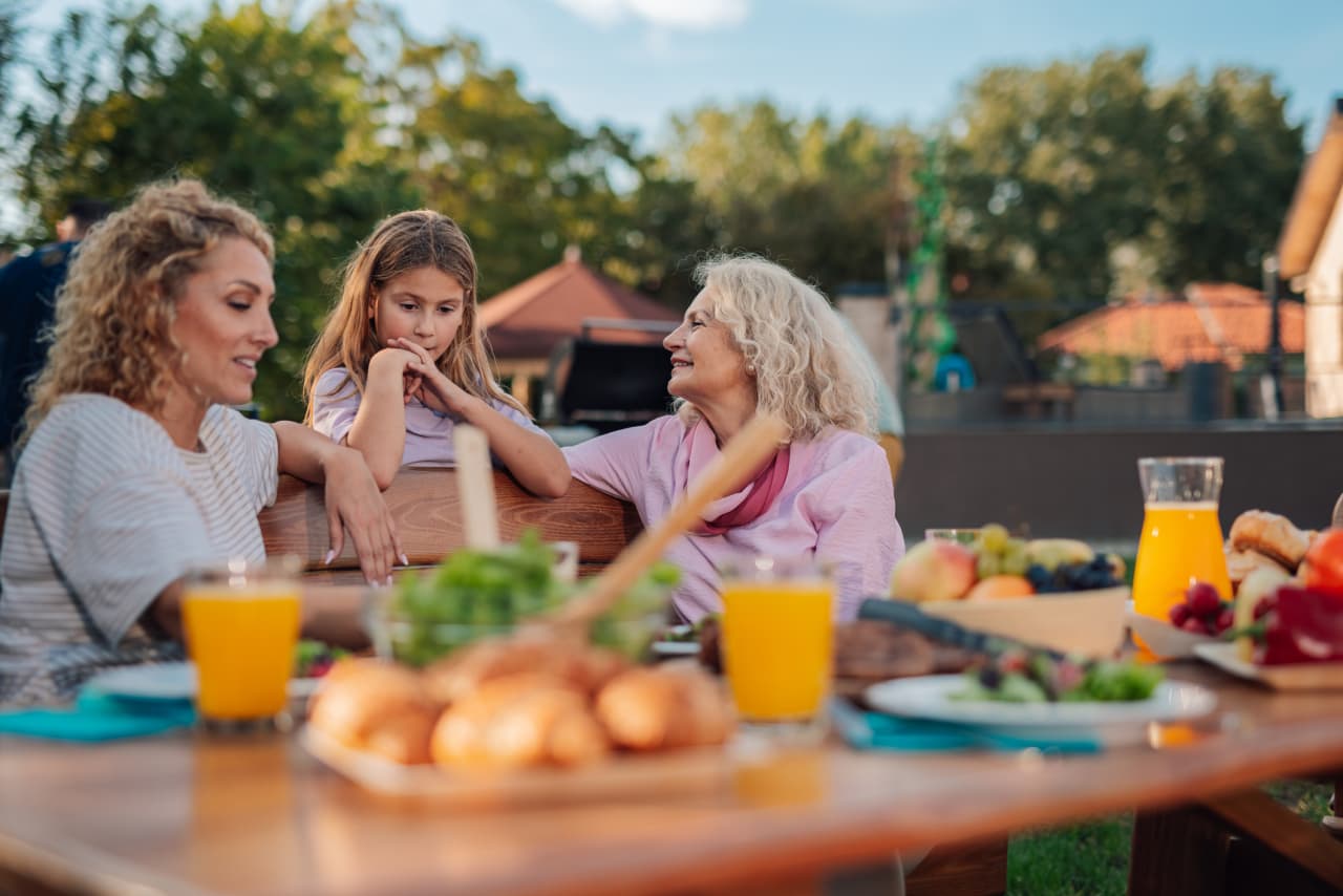 A family gathering in NYC, showcasing the importance of financial support among generations.
