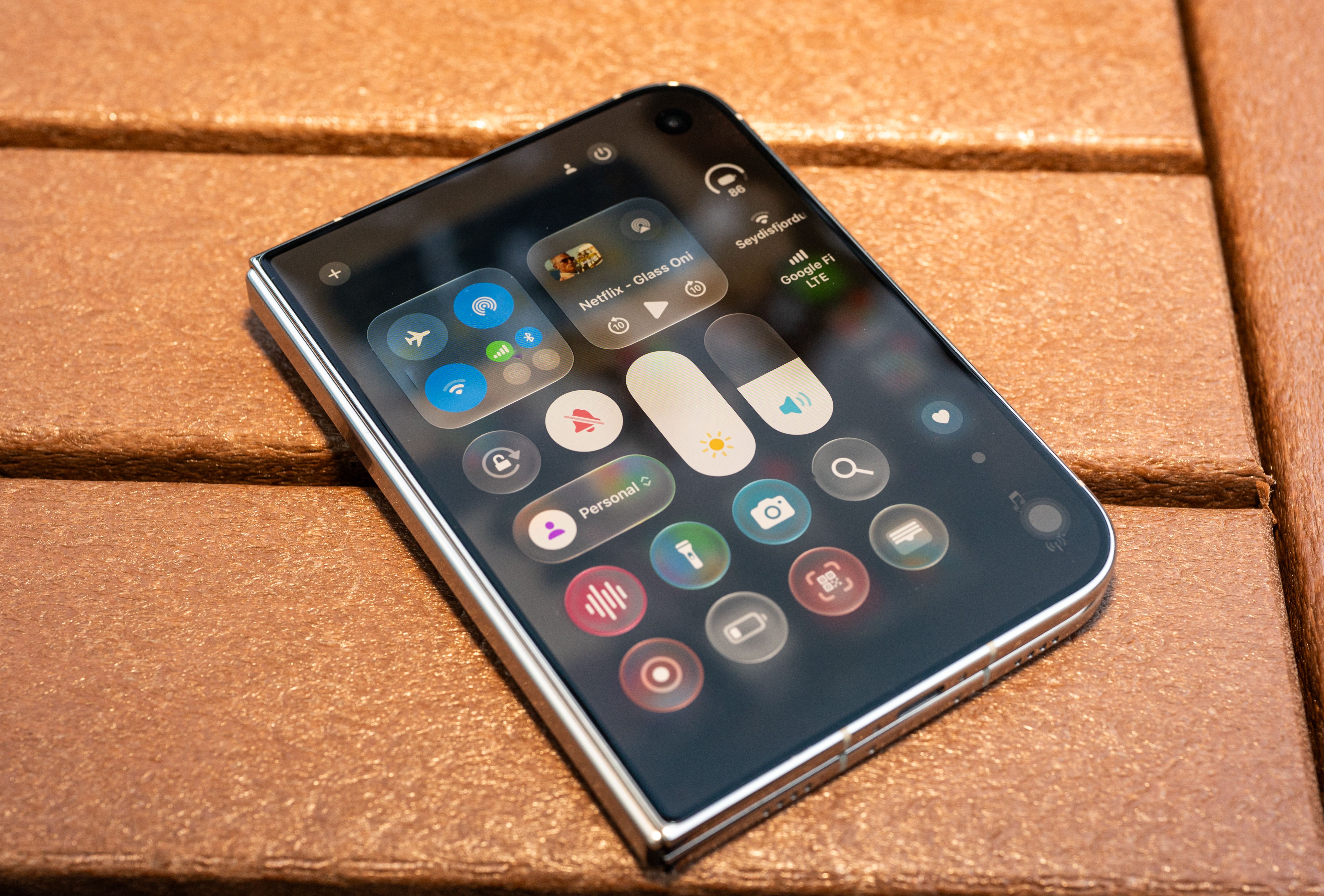 Liquid Glass Finally Makes Sense on the iPhone Duo — Wired